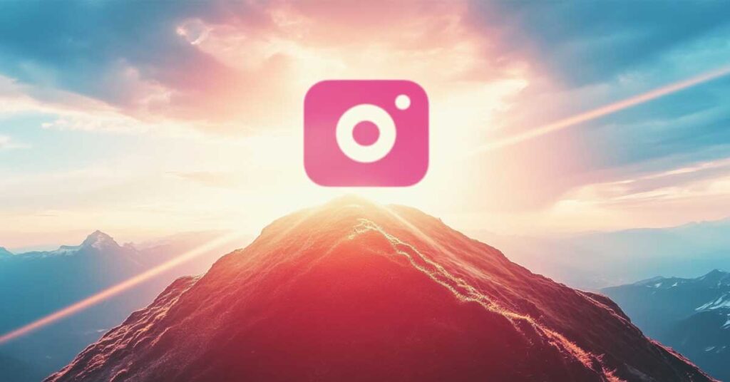 Instagram on a mountain top with the sunrise behind it. 