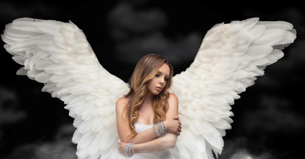 An angel with an apparently great reputation with giant white wings on a dark background.